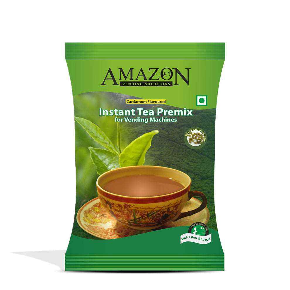 Amazon cardamom tea premix for vending machines in green packaging with a cup of tea and tea leaves