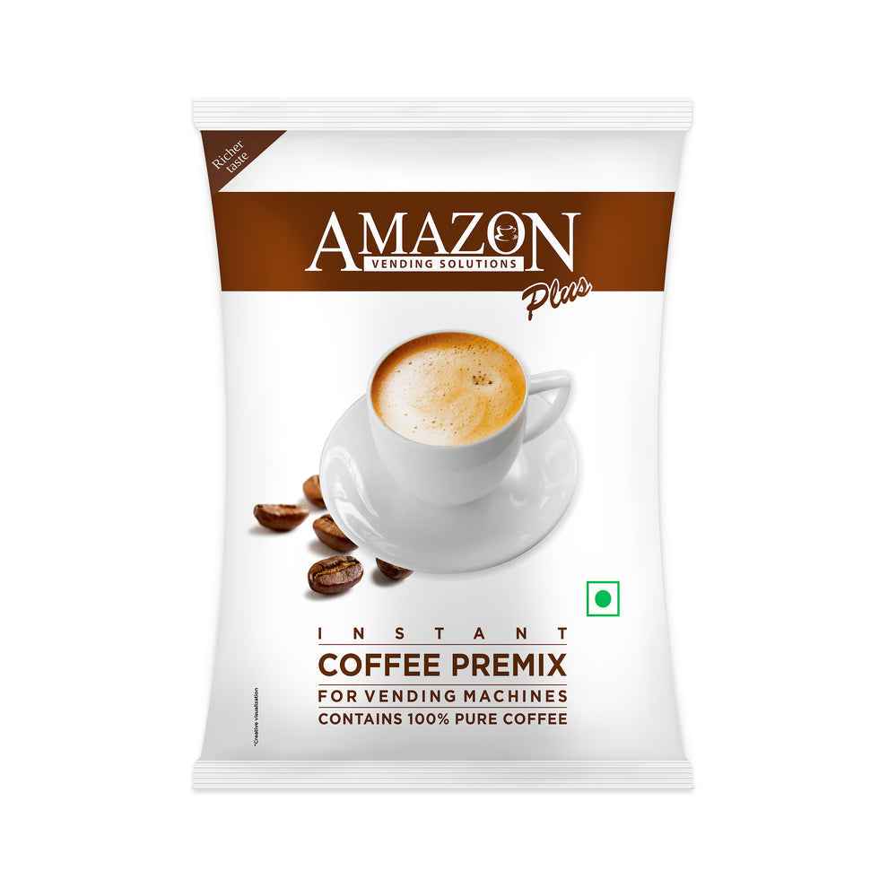 Amazon Plus coffee premix 1kg packet with white cup of frothy coffee and coffee beans