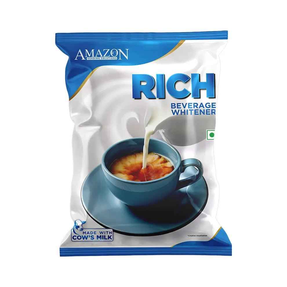 AMAZON RICH beverage whitener 500g packet with cow's milk, showing cup of tea with milk pouring