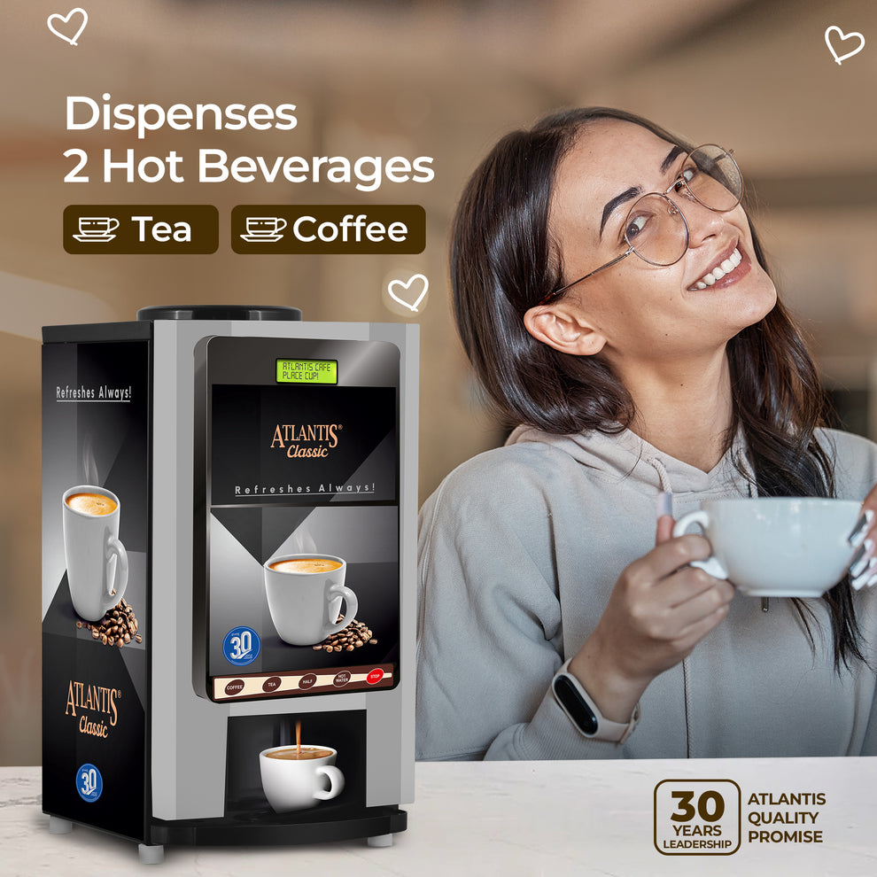 Atlantis Classic 2-lane tea and coffee vending machine by COFFEE WALLA dispensing two hot beverages with woman enjoying a cup