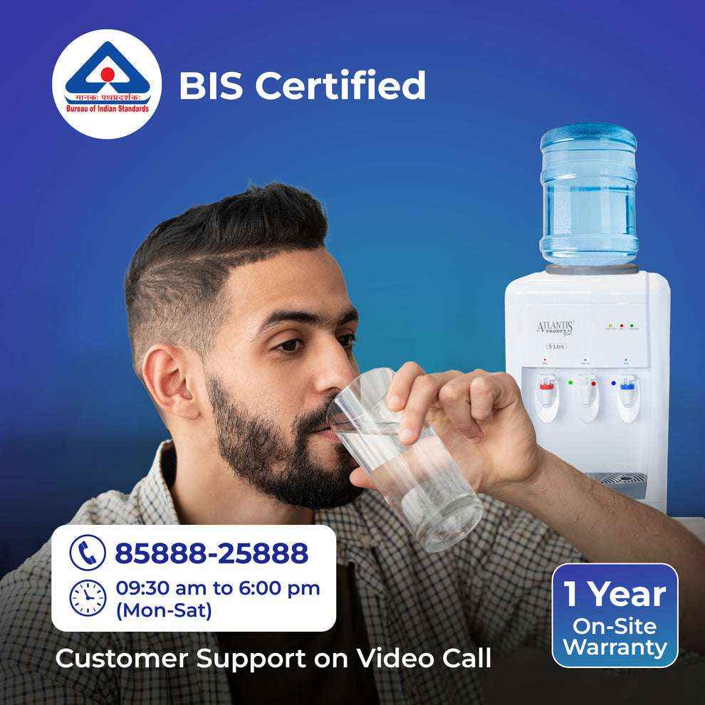 Man drinking water from a glass near ATLANTIS FROSTY PLUS hot cold normal water dispenser with BIS certification