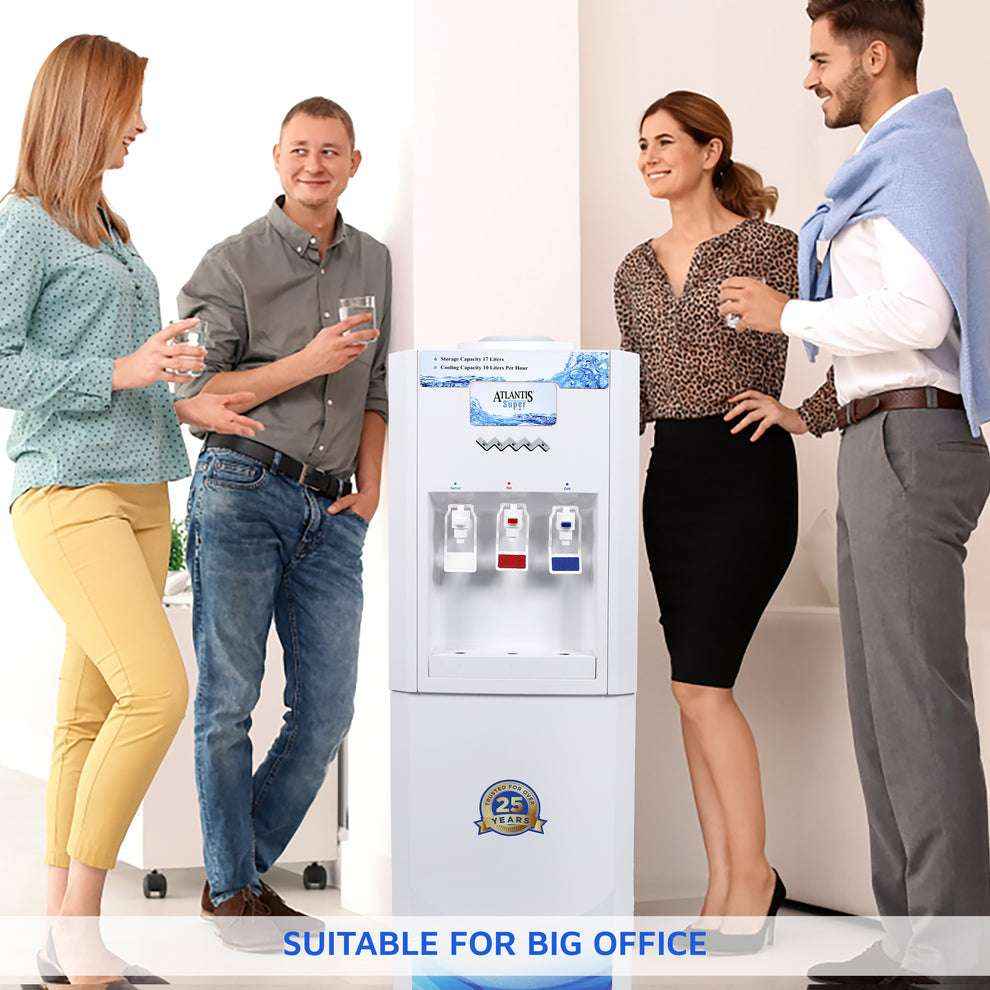 Four office workers standing around an Atlantis super water dispenser drinking water in a professional office setting