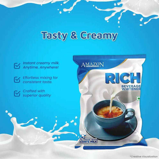 AMAZON RICH beverage whitener 500g packet with creamy milk pouring into a cup of tea on blue background