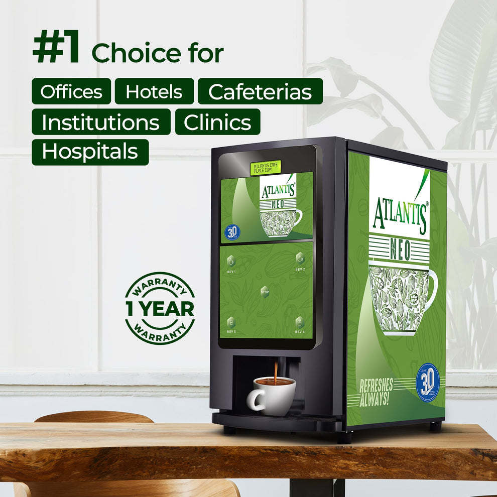 4-lane coffee vending machine for offices with green Atlantis Neo design on a wooden table