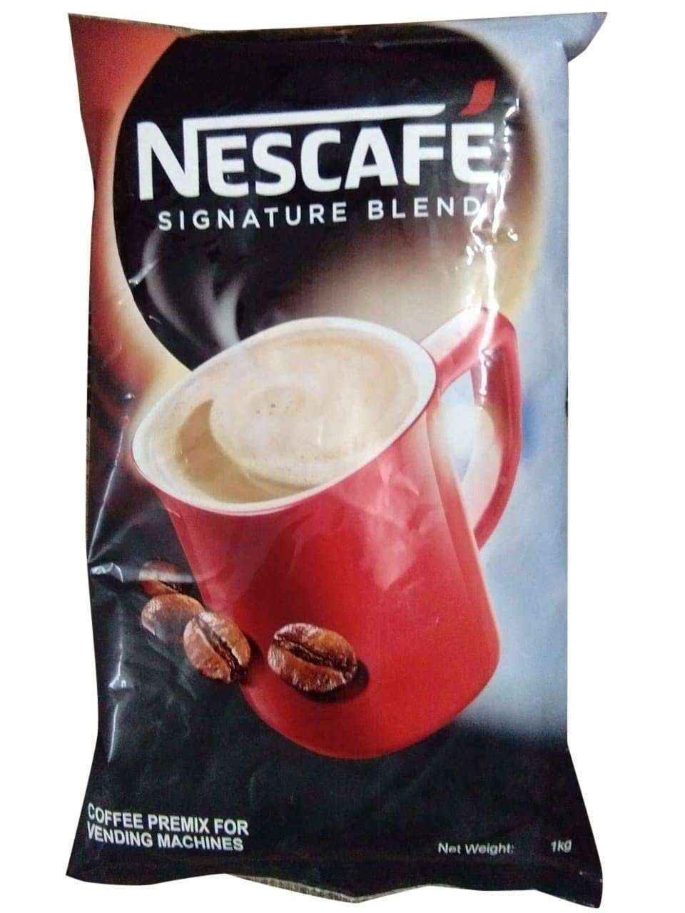 Nescafe Signature Blend vending machine coffee premix packet with red cup and coffee beans