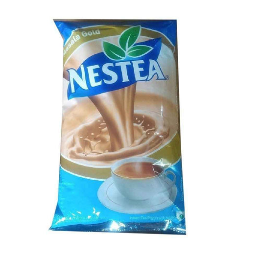 Nestea instant tea premix 1kg packet with creamy tea splash and white cup on blue background